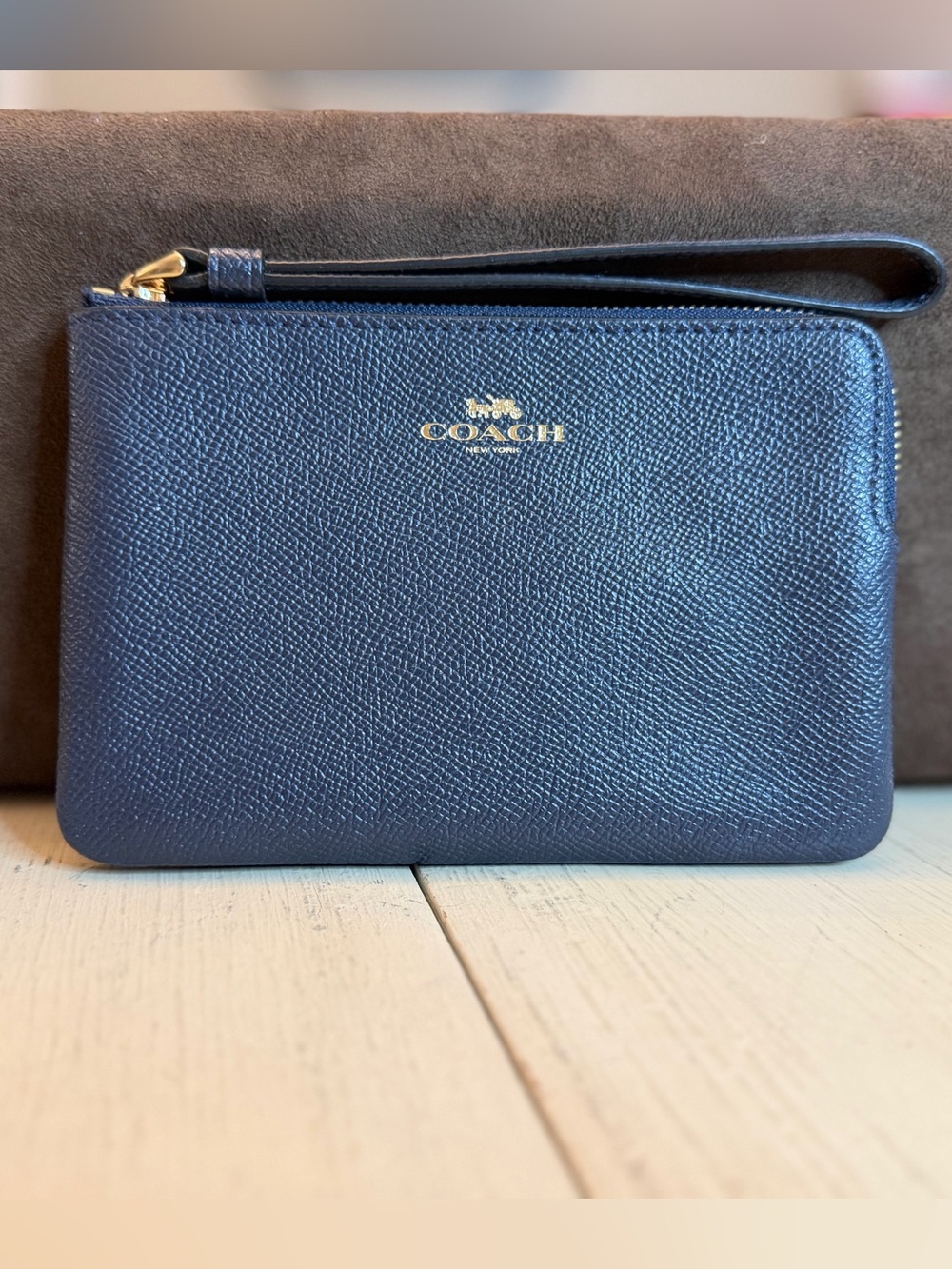 Coach Navy Pebbled Leather Wristlet with Gold Accent